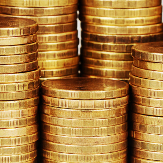 Stack of golden coins: Metals Wired Gold Blog